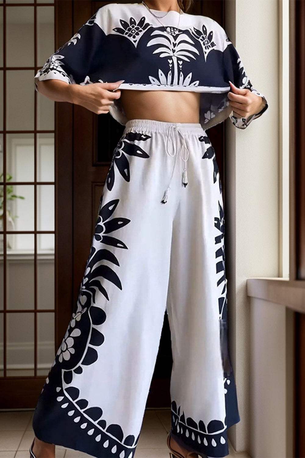 Printed Half Sleeve Top and Wide Leg Pants SetFeatures: Tied
Number of pieces: Two-piece
Stretch: No stretch
Material composition: 100% polyester
Care instructions: Machine wash cold. Tumble dry low.
Imported
PrPrinted Half Sleeve TopDressesPrinted Half Sleeve Top