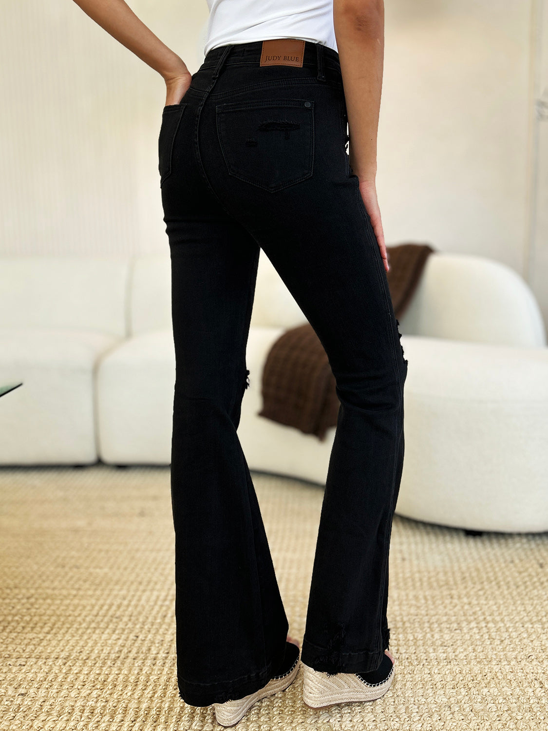 Judy Blue Full Size High Waist Distressed Flare JeansHigh Waist Distressed Flare Jeans are a fashionable choice for a retro-inspired look. The high waist design offers a flattering silhouette by accentuating the waist.Stretchy JeansStretchy Jeans