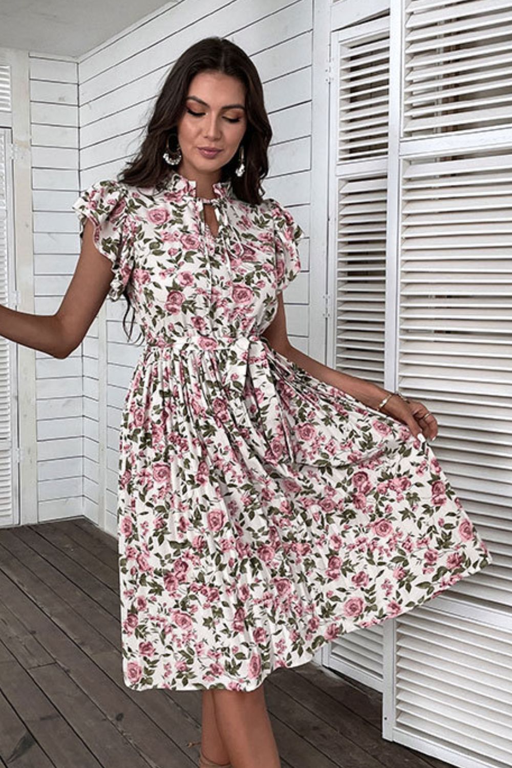 Perfee Floral Tie-Neck Flutter Sleeve Midi DressPattern: Floral
Features: Pleated, tie-waist, flutter sleeves
Neckline: Tie-neck
Stretch: No stretch
Product measurements:
S: bust 37 in, length 42 in, shoulder 14 iPerfee Floral Tie-Neck Flutter Sleeve Midi DressPerfee Floral Tie-Neck Flutter Sleeve Midi Dress