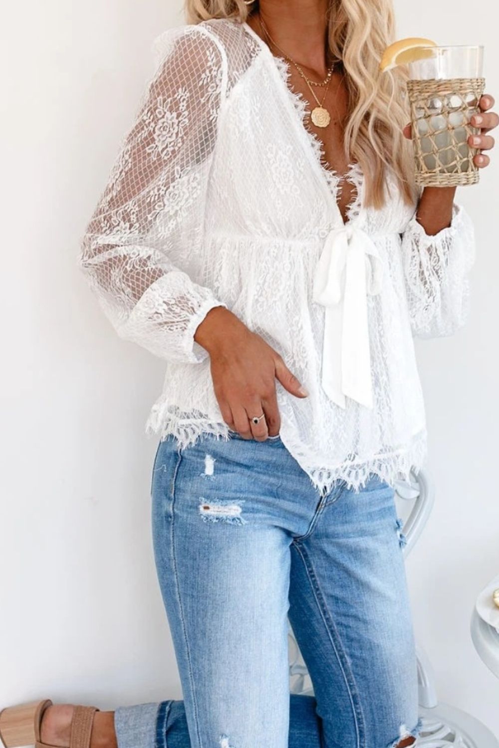 Lace Detail Plunge Long Sleeve BlouseElevate your wardrobe with our Lace Detail Plunge Long Sleeve Blouse. Featuring a flattering plunge neckline and delicate lace accents, this blouse exudes elegance aLace Detail Plunge Long Sleeve BlouseLace Detail Plunge Long Sleeve Blouse