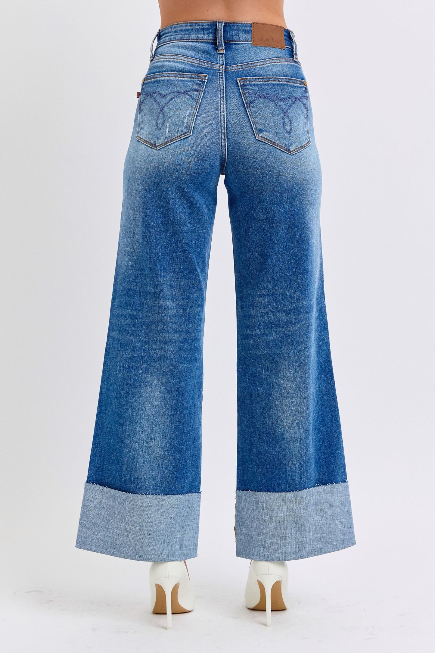 Judy Blue Full Size Distressed High Waist Wide Leg JeansThe Distressed High Waist Wide Leg Jeans are a stylish and on-trend choice for adding a touch of edge to your denim collection. The high waist design offers a flatteJudy Blue Full Size Distressed High Waist Wide Leg JeansJudy Blue Full Size Distressed High Waist Wide Leg Jeans