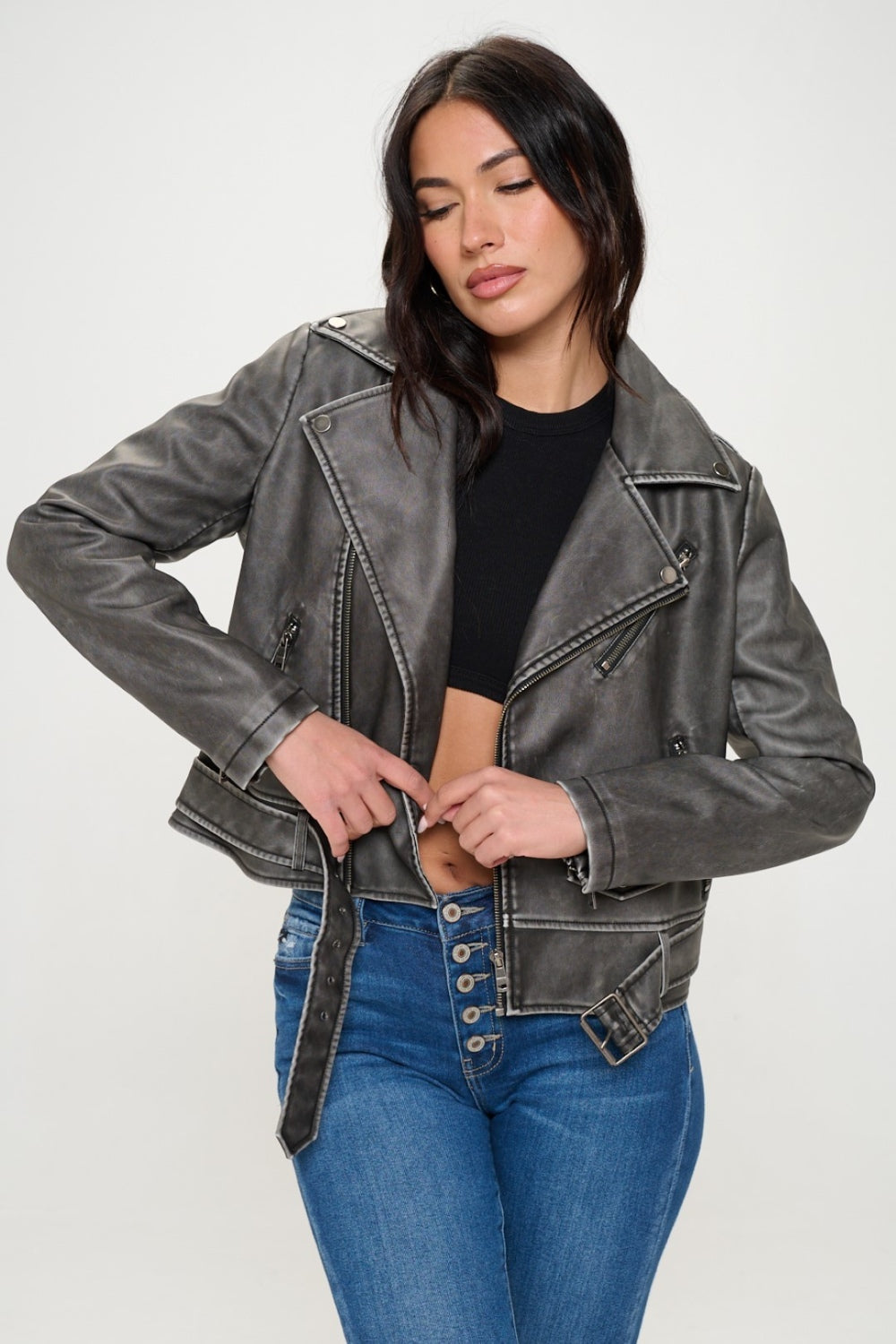 Coalition LA Zip Up Biker Jacket with BeltThis zip-up biker jacket features a stylish design with a notched lapel and a belt for a trendy look. The asymmetrical zipper adds an edgy touch to the jacket. Two zCoalition LA ZipCoalition LA Zip