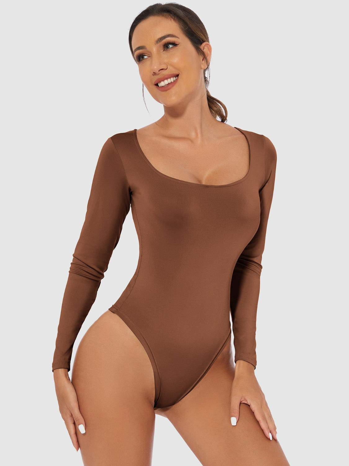 Full Size Scoop Neck Long Sleeve BodysuitFeatures: Basic style
Sheer: Opaque
Stretch: Slightly stretchy
Material composition: 65% polyester, 35% elastane
Care instructions: Machine wash cold. Tumble dry lowFull Size Scoop Neck Long Sleeve BodysuitFull Size Scoop Neck Long Sleeve Bodysuit