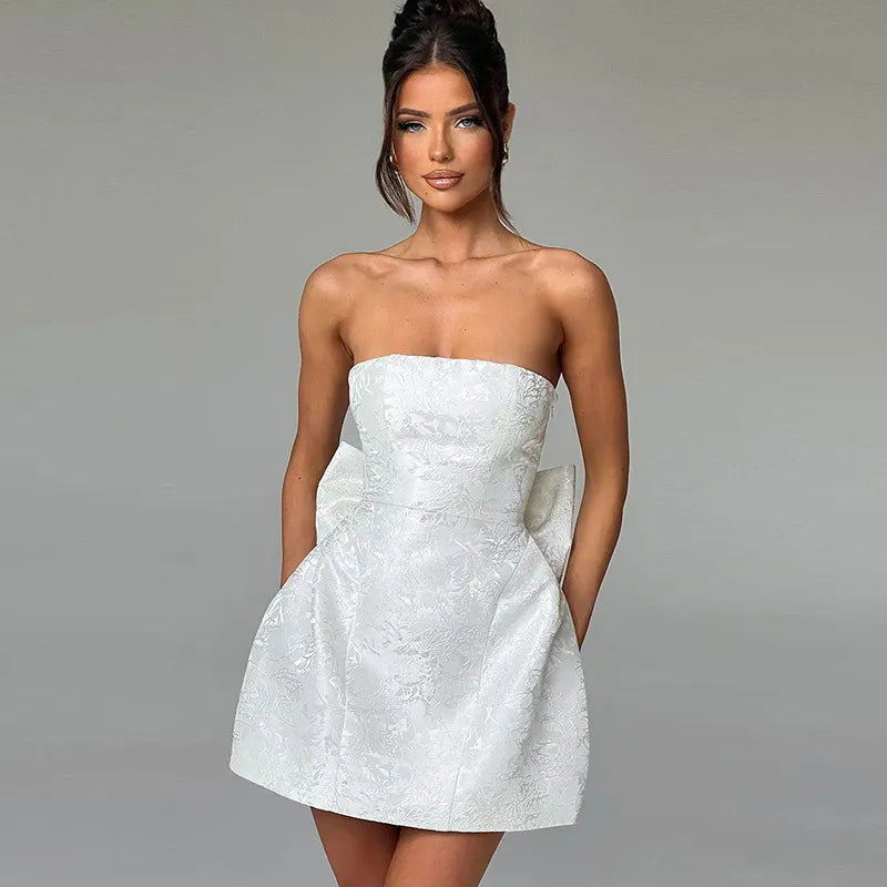 Chic White Tube Top Bow Dress – Elegant A-Line Silhouette for Modern WEffortless Elegance with the Tube Top Bow DressStep into style with this Chic White Tube Top Bow Dress, thoughtfully designed for women who adore a blend of eleganceChic White Tube Top Bow Dress – ElegantChic White Tube Top Bow Dress – Elegant