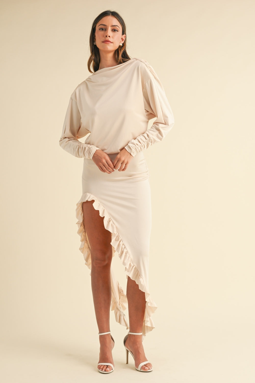 Mable Backless Asymmetric Ruffle Hem DressThe Backless Asymmetric Ruffle Hem Dress is a show-stopping piece that combines sexy and sophisticated elements. The solid stretchy fabric conforms to your body beauMable Backless Asymmetric Ruffle Hem DressMable Backless Asymmetric Ruffle Hem Dress