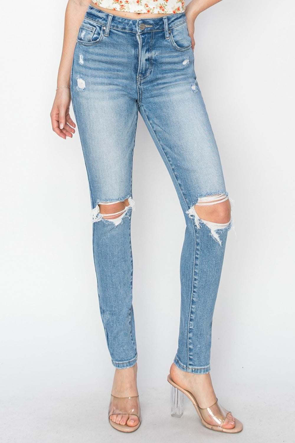 Risen Full Size High Rise Knee Distressed Skinny JeansThe High Rise Knee Distressed Skinny Jeans are a must-have for any fashion-forward wardrobe. Featuring a high-rise waist and skinny fit, these jeans offer a flatteriRisen Full Size High Rise Knee Distressed Skinny JeansRisen Full Size High Rise Knee Distressed Skinny Jeans