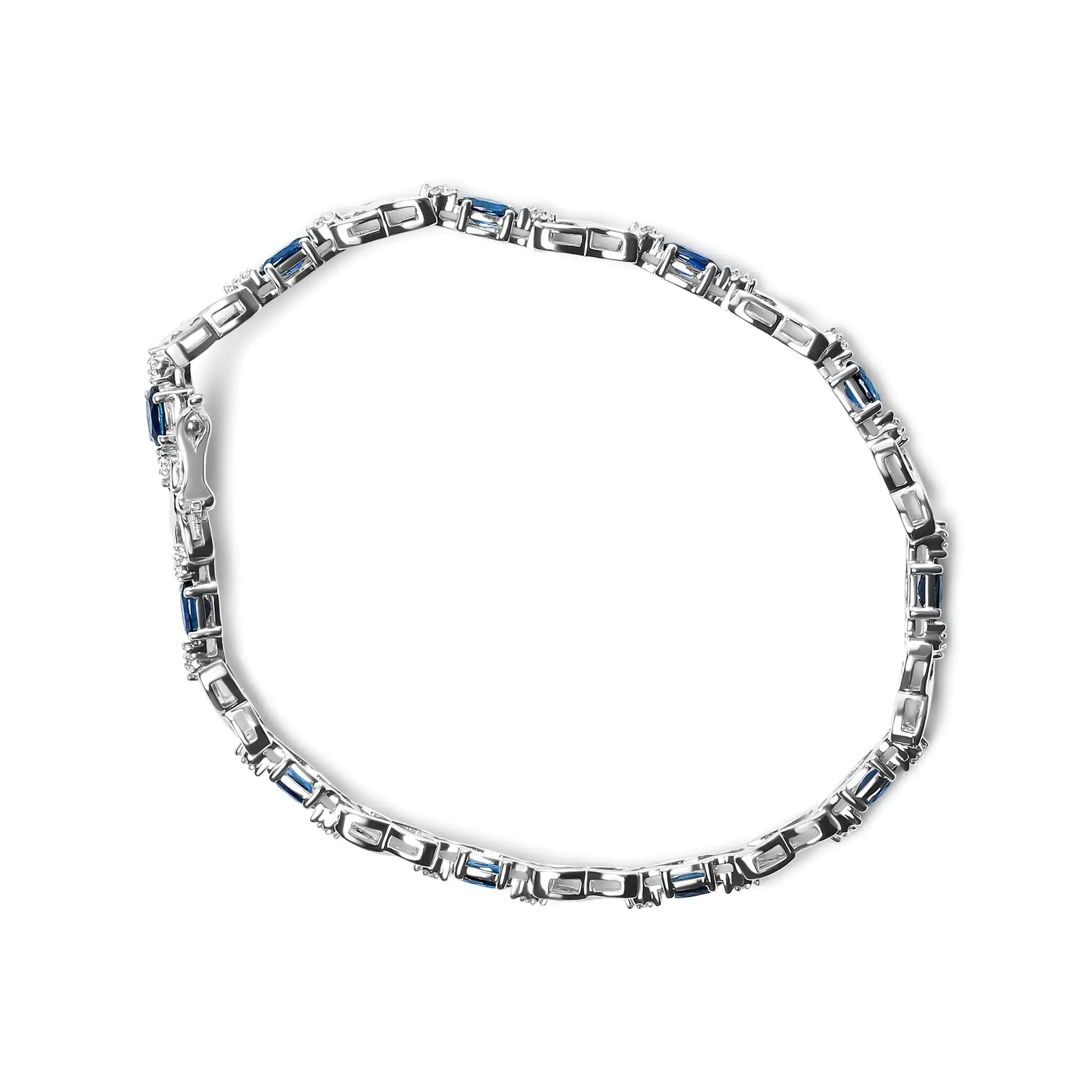 10K White Gold Blue Sapphire & Diamond X-Link Bracelet – Timeless ElegEmbrace timeless elegance with this 10K White Gold Blue Sapphire &amp; Diamond X-Link Bracelet. Featuring vibrant blue sapphires paired with sparkling diamonds, the 10K White Gold Blue Sapphire & DiamondBracelet10K White Gold Blue Sapphire & Diamond