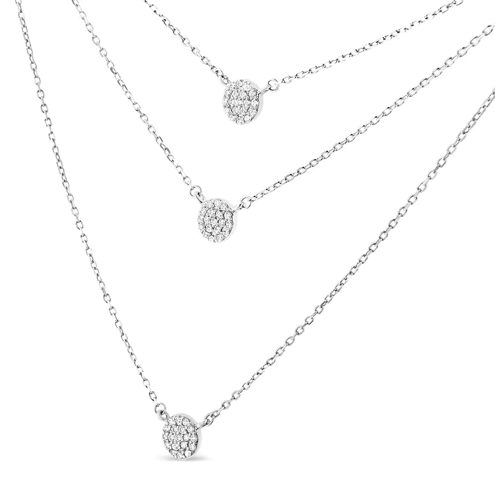 Sterling Silver Round Diamond Medallion Multi-Strand Tri Pendant 18" NThree chains provide a pre-layered look for your day or evening attire when you slip on the sparkling splendor of this tri pendant necklace. Three circular medallionSterling Silver Round Diamond Medallion Multi-Strand Tri Pendant 18" NecklaceSterling Silver Round Diamond Medallion Multi-Strand Tri Pendant 18" Necklace