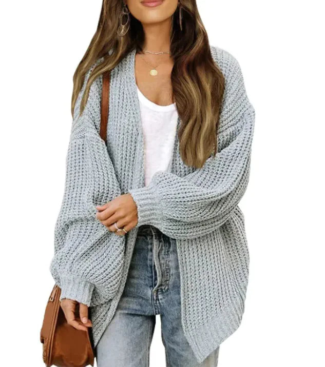 Loose Retro Sweater Coat Women's Mid-length Knitted CardiganCozy up in style with our Loose Retro Sweater Coat! Designed for modern women who love a touch of vintage flair, this mid-length knitted cardigan combines comfort anLoose Retro Sweater Coat Women'Loose Retro Sweater Coat Women'