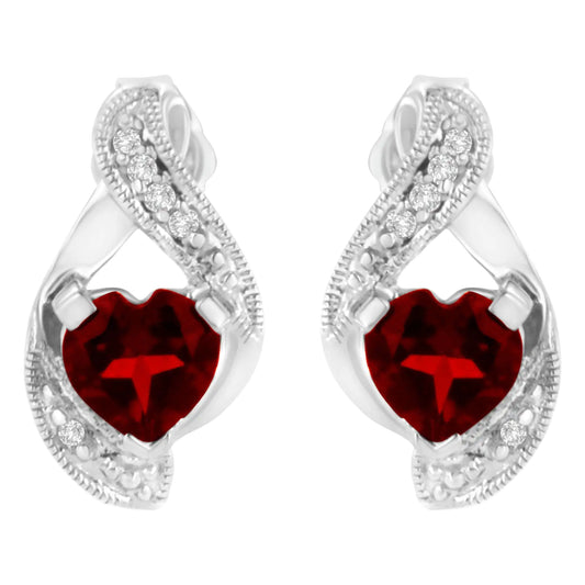 14KT White Gold 6x6mm Created Red Heart Garnet and Diamond Accent EarrFascinate your special one with the sparkling color of these Garnet and Diamond Earrings crafted in luminous 14 karat white gold. This elegant pair of earrings featu14KT White Gold 6x6mm Created Red Heart Garnet14KT White Gold 6x6mm Created Red Heart Garnet