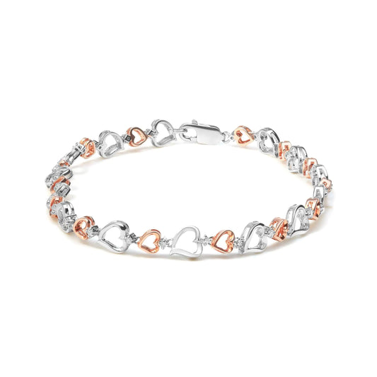 14K Rose Gold Plated .925 Sterling Silver 1/4 Cttw Diamond Heart Link Introducing a stunning and romantic piece of jewelry, perfect for showing your love and affection. This beautiful 14K rose gold plated sterling silver heart link bra14K Rose Gold Plated14K Rose Gold Plated