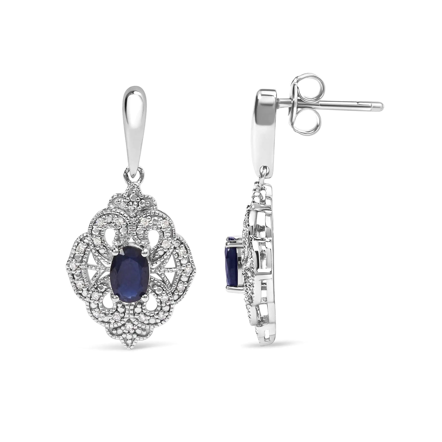 Sterling Silver Oval Blue Sapphire and White Diamond Accent Art Deco SEmbark on a journey of timeless elegance with these exquisite Art Deco-inspired shield dangle earrings. Crafted from the finest .925 sterling silver, they showcase tWhite Diamond Accent Art Deco Style Shield Dangle EarringWhite Diamond Accent Art Deco Style Shield Dangle Earring