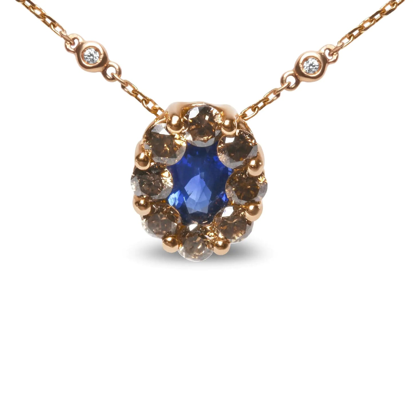 18K Rose Gold White and Brown Diamond Gemstone Necklace Oval Blue SappElevate your style with this stunning 18k rose gold station necklace, perfect for any occasion. Featuring a captivating 7 x 4mm oval heat-treated blue sapphire set i18K Rose Gold White and Brown Diamond Gemstone Necklace18K Rose Gold White and Brown Diamond Gemstone Necklace