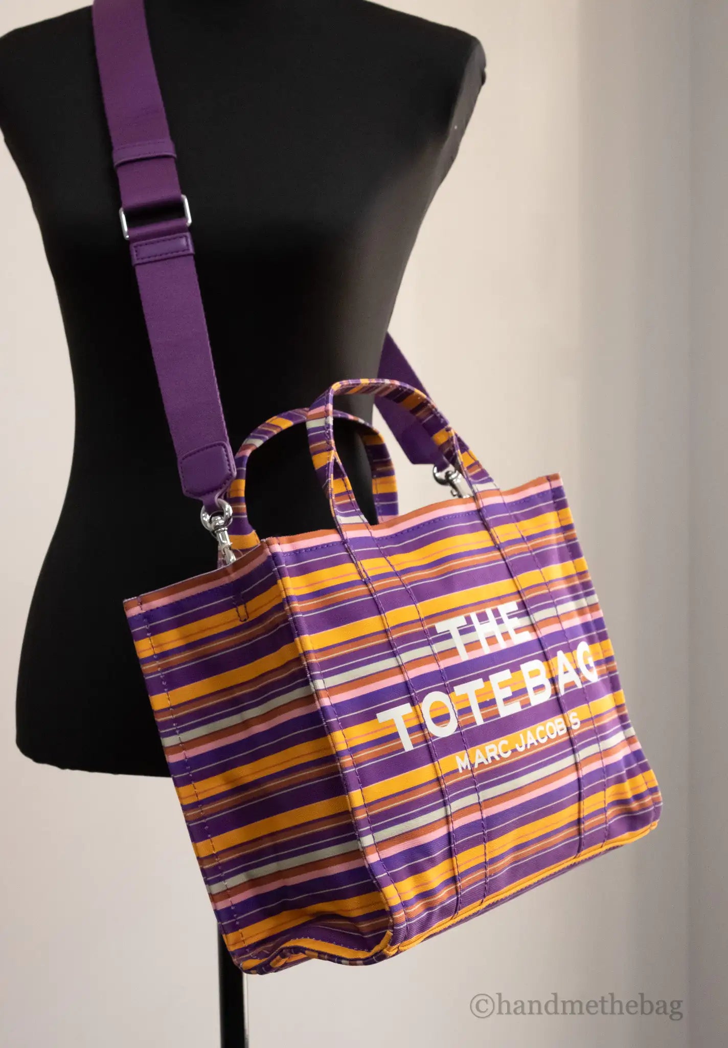 Marc Jacobs The Striped Traveler Tote Medium Purple Cotton Canvas HandMarc Jacobs The Striped Traveler Tote – Medium Purple Cotton Canvas Handbag﻿Add a pop of color to your wardrobe with Marc Jacobs The Striped Traveler Tote in medium Striped Traveler Tote Medium Purple Cotton Canvas Handbag PurseStriped Traveler Tote Medium Purple Cotton Canvas Handbag Purse