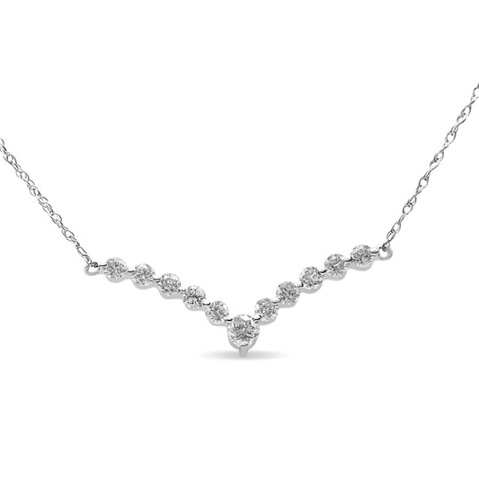 10K white gold V-shaped necklace with 1/2 Cttw round-cut diamonds on 18" rolo chain.