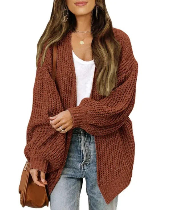 Loose Retro Sweater Coat Women's Mid-length Knitted CardiganCozy up in style with our Loose Retro Sweater Coat! Designed for modern women who love a touch of vintage flair, this mid-length knitted cardigan combines comfort anLoose Retro Sweater Coat Women'Loose Retro Sweater Coat Women'