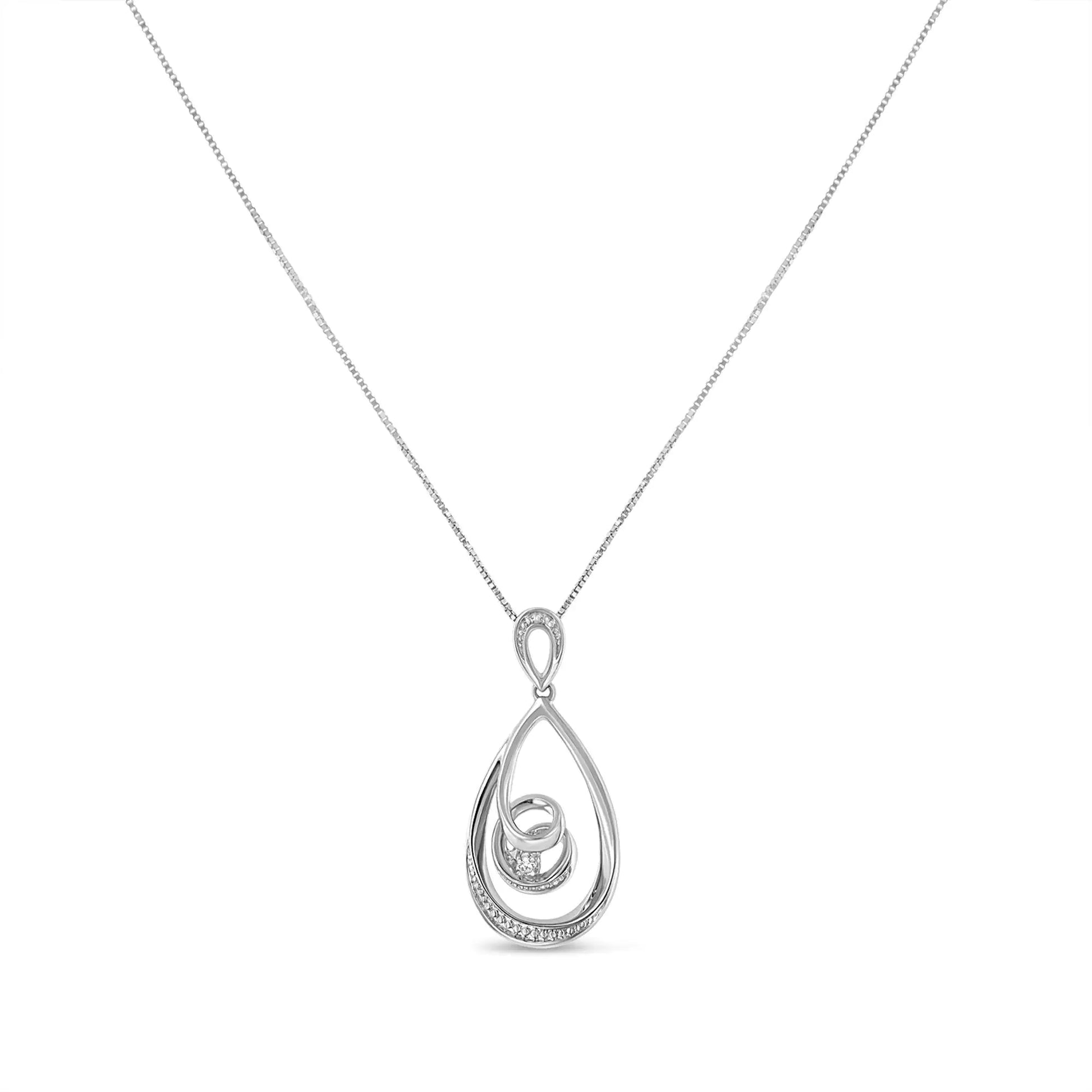 10K White Gold Diamond Accented Open Teardrop Twisted Curl 18" PendantYou'll be captivated by this magical style. Let everyone adore your gorgeous looks with this beautiful pendant. The pendant is crafted of 10 karats white gold and is10K White Gold Diamond Accented Open Teardrop Twisted Curl 18" Pendant Necklace Necklace10K White Gold Diamond Accented Open Teardrop Twisted Curl 18" Pendant Necklace 