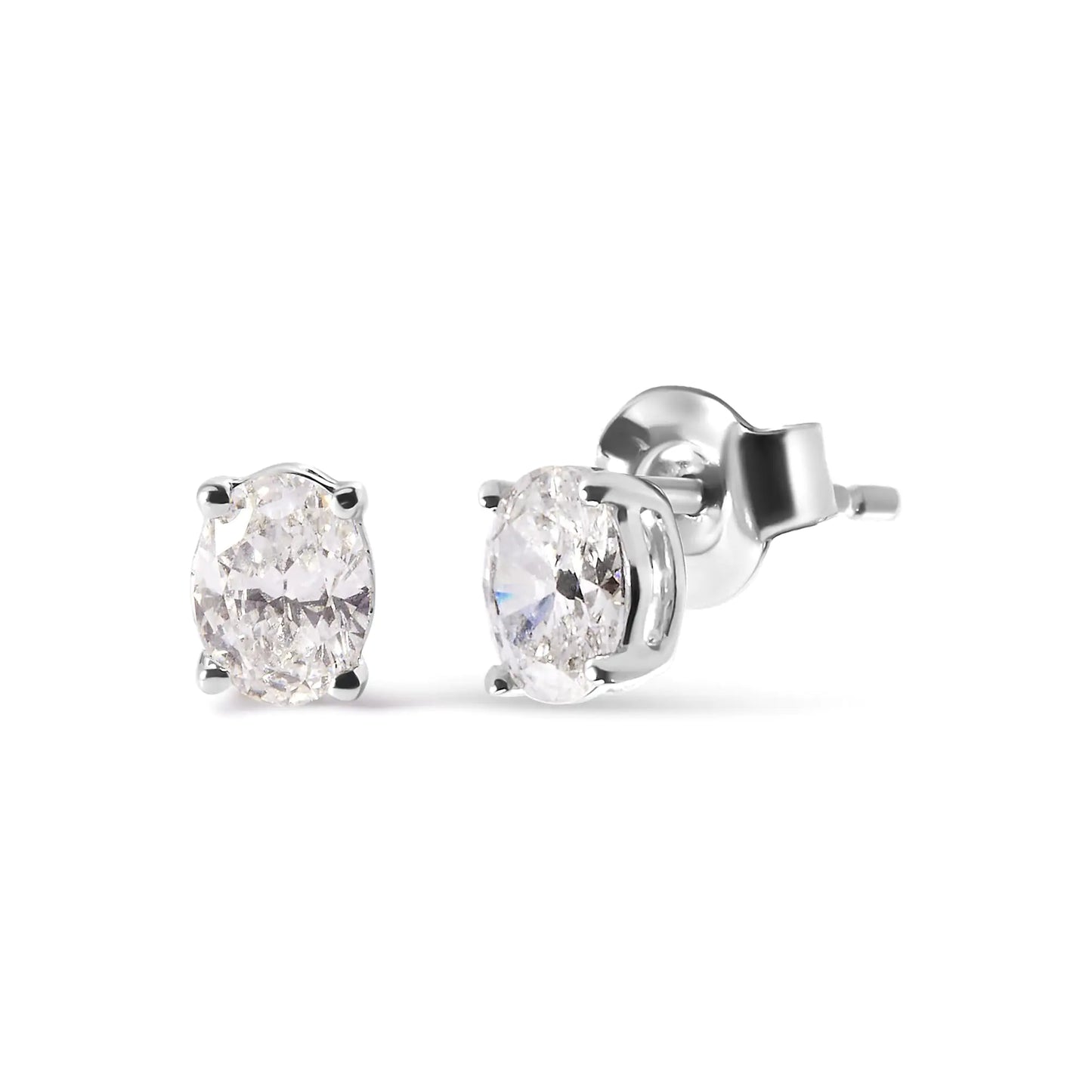 14K White Gold Prong Set Lab Grown Oval Diamond Solitaire Stud EarringIndulge in the ultimate luxury with these exquisite oval shape lab-grown diamond solitaire stud earrings. Crafted from 14K white gold, these earrings feature a stunn14K White Gold Prong Set Lab Grown Oval Diamond Solitaire Stud EarringEarrings14K White Gold Prong Set Lab Grown Oval Diamond Solitaire Stud Earring