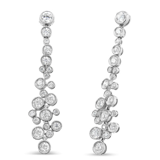 18K white gold round diamond waterfall drop dangle stud earrings with milgrain bezel settings.