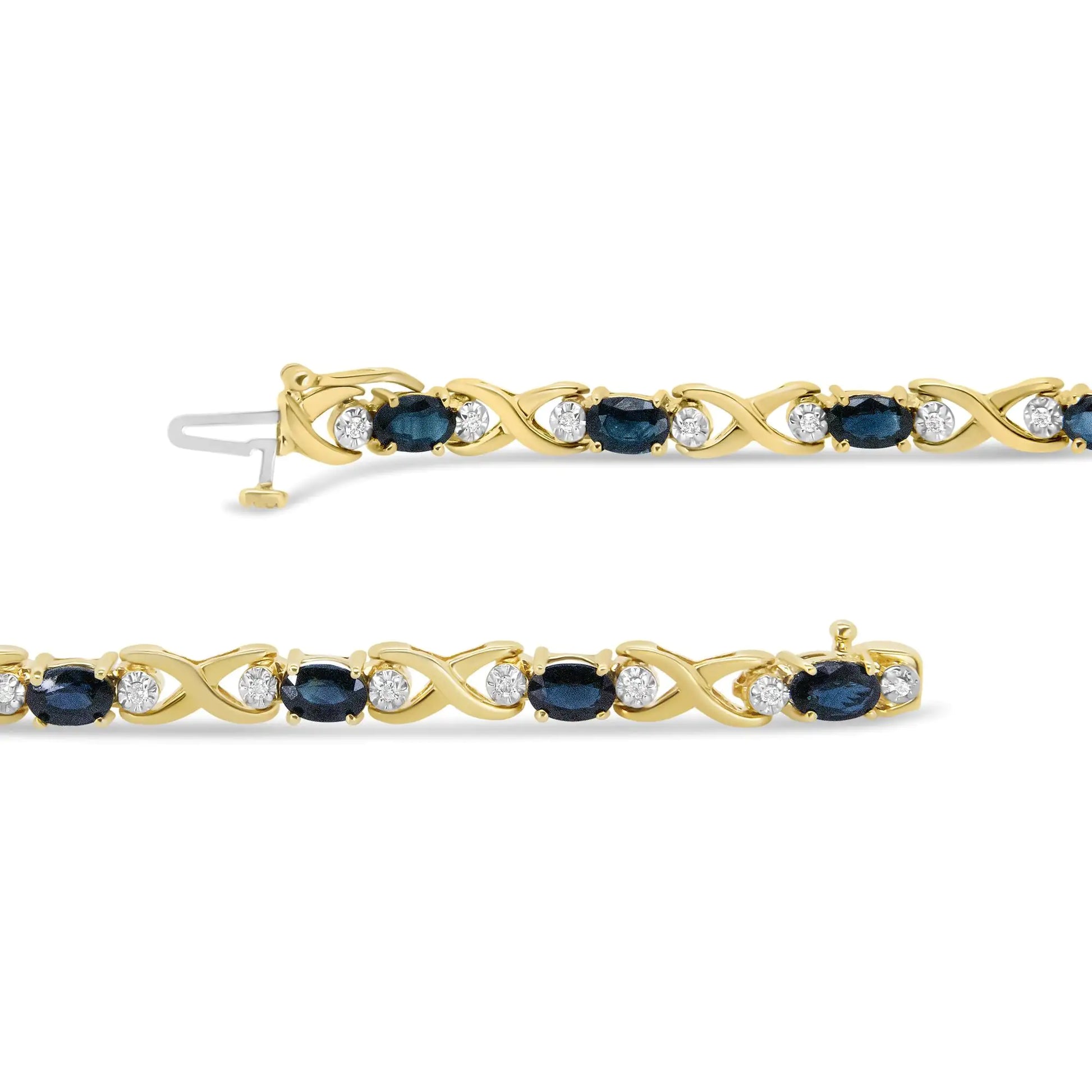 14K Yellow Gold 1 1/4 Cttw Round Diamond and 6x4mm Blue Sapphire "X" LMasterfully set in a unique motif and illuminated with the sparkle of round diamonds, this gemstones in link bracelet are remarkable! Stunning 6x4mm oval blue sapphi14K Yellow Gold 1 14 Cttw Round Diamond14K Yellow Gold 1 14 Cttw Round Diamond