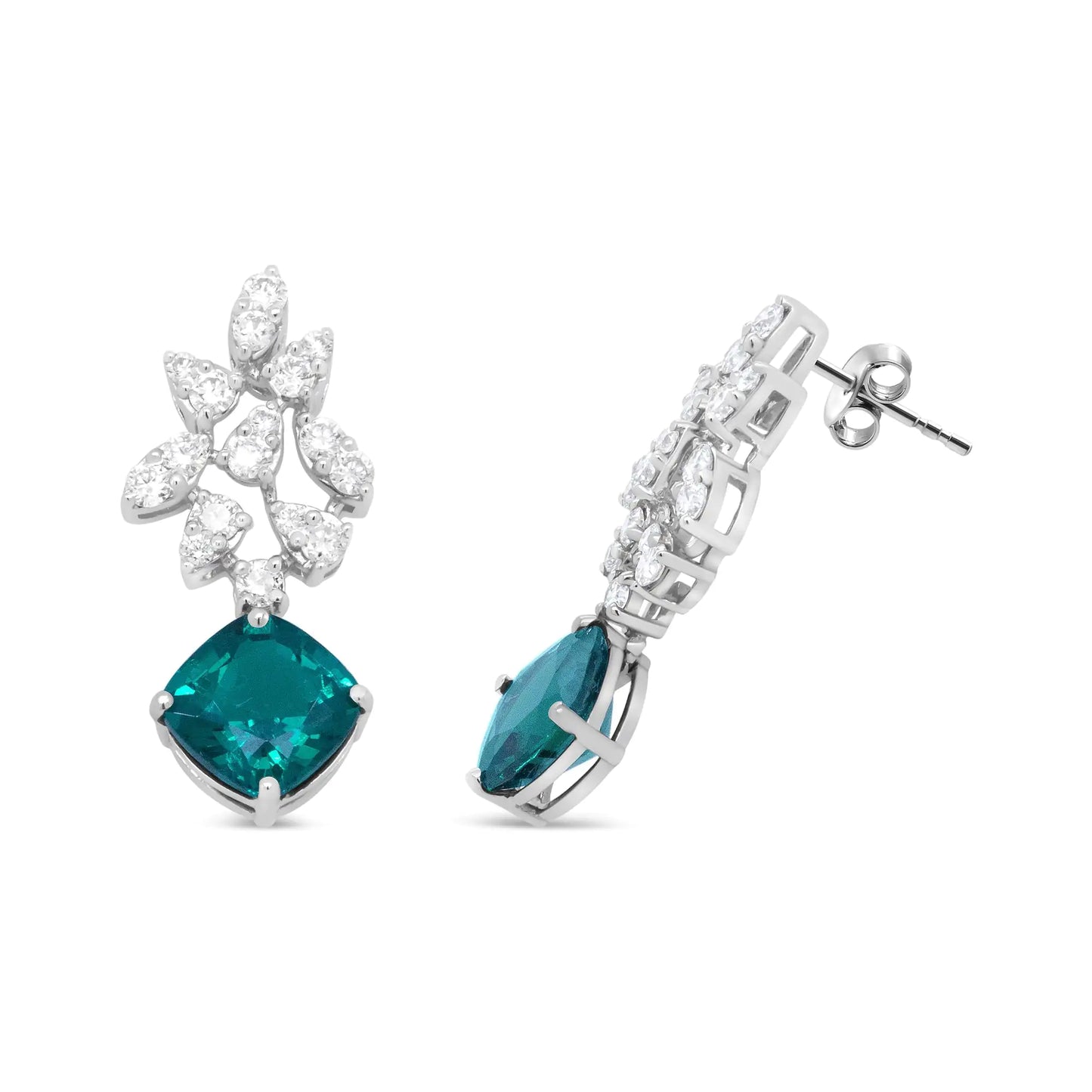 18K White Gold 1 1/10 Cttw Diamond and 7.9 x 7.7mm Green Emerald Drop Elevate your style with the rich sparkle that gleams from these gemstone and diamond drop earrings made from genuine 18k white gold. The upper dangle of this brillia7Earrings7