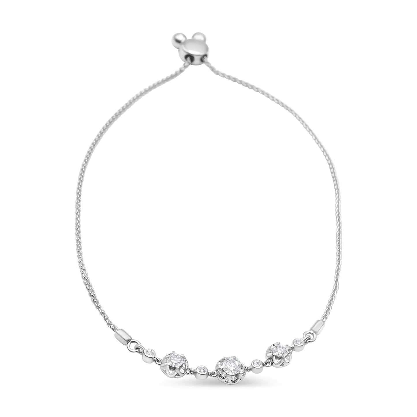 14K white gold diamond bolo bracelet with adjustable 7-9.5 inch length featuring prong and bezel-set diamonds.