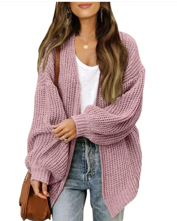 Loose Retro Sweater Coat Women's Mid-length Knitted CardiganCozy up in style with our Loose Retro Sweater Coat! Designed for modern women who love a touch of vintage flair, this mid-length knitted cardigan combines comfort anLoose Retro Sweater Coat Women'Loose Retro Sweater Coat Women'